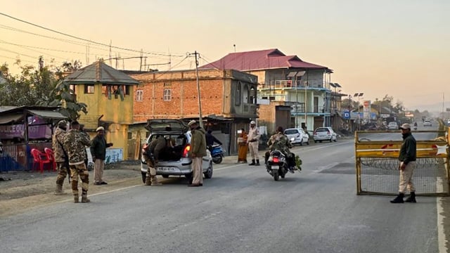 Security personnel during a search operation and area domination in the fringe and vulnerable areas of hill and valley districts, in Manipur.