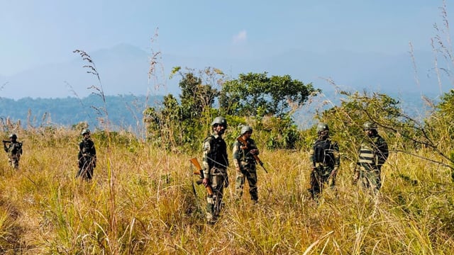 Police and security personnel during a search operation in the fringe and vulnerable areas of hill and valley districts of Manipur.