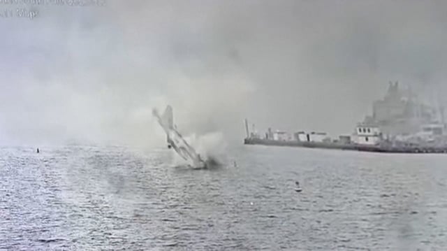 Video shows a military fighter jet crash into the San Diego Bay, the two pilots survive