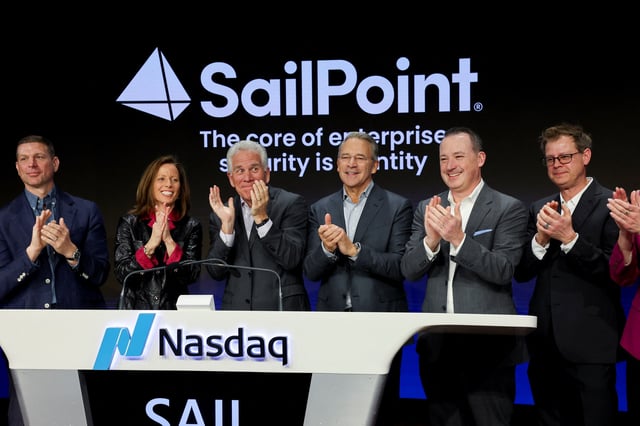 Mark McClain, CEO and founder of SailPoint, a cybersecurity company and Adena Friedman, President and CEO of Nasdaq, react as they ring the bell during the company's IPO at the Nasdaq Market, in New York City, New York, U.S., February 13, 2025. REUTERS/Brendan McDermid