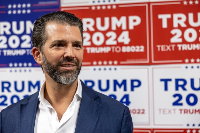 Donald Trump Jr. speaks to media at a rally for his father, then-GOP presidential candidate Donald Trump on February 23, 2024, in Charleston, South Carolina.