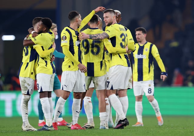 Soccer Football - Europa League - Knockout Phase Playoff - First Leg - Fenerbahce v Anderlecht - Sukru Saracoglu Stadium, Istanbul, Turkey - February 13, 2025 Fenerbahce's Milan Skriniar celebrates with teammates after the match REUTERS/Murad Sezer