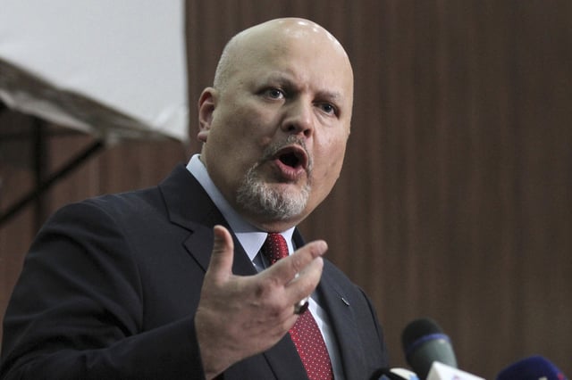 FILE - Karim Ahmed Khan, International Criminal Court chief prosecutor, speaks during a news conference in Khartoum, Sudan, Aug. 12, 2021. (AP Photo/Marwan Ali, File)