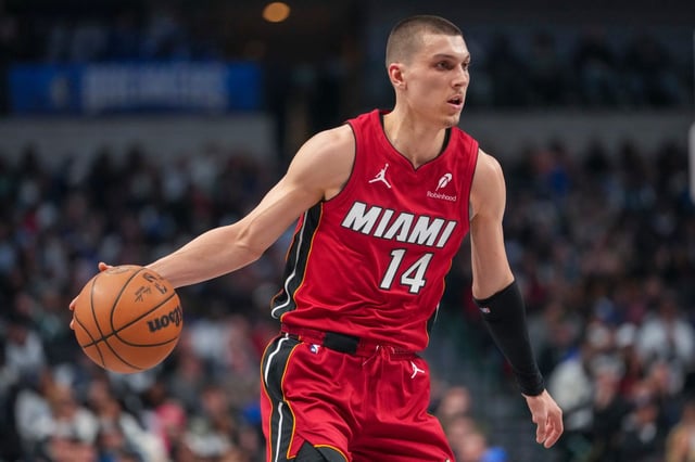 Miami Heat guard Tyler Herro works the floor against the Dallas Mavericks during the first half of an NBA basketball game Thursday, Feb. 13, 2025, in Dallas. (AP Photo/Julio Cortez)