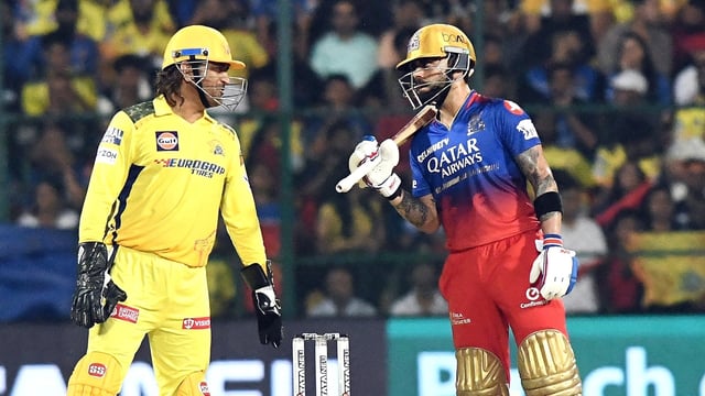 Chennai Super Kings' MS Dhoni and Royal Challengers Bengaluru's Virat Kohli during an IPL 2024 match.
