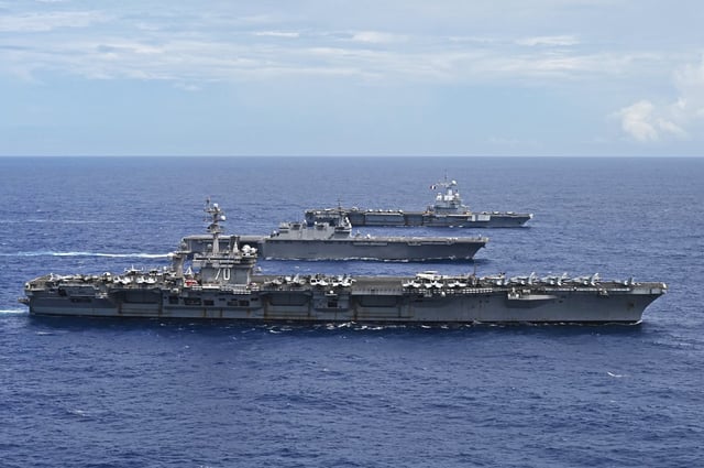In this photo provided by the Japan Maritime Self-Defense Force on February 13, 2025, United States aircraft carrier USS Carl Vinson, front, Japanese aircraft carrier JS Kaga, middle, and French aircraft carrier FS Charles De Gaulle sail in formation in the Philippine Sea during Exercise Pacific Steller 2025.