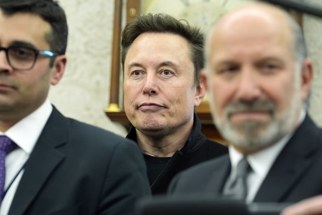 FILE - Elon Musk listens as President Donald Trump meets with India's Prime Minister Narendra Modi in the Oval Office of the White House, Thursday, Feb. 13, 2025, in Washington. (Photo/Alex Brandon,File)