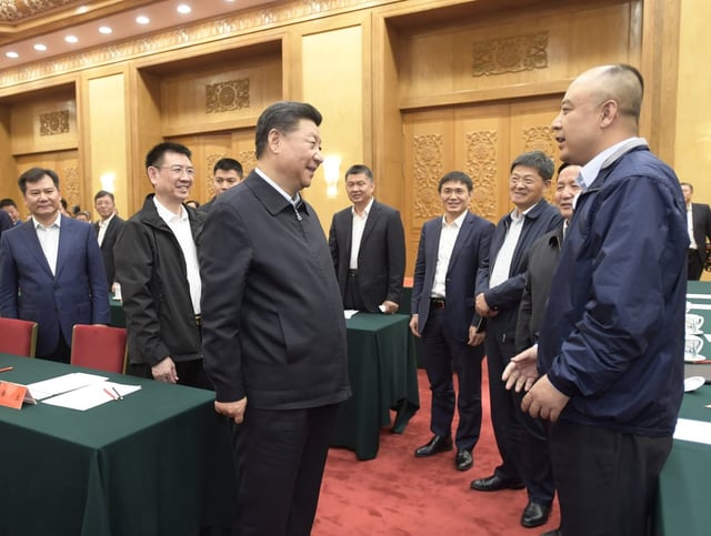 Chinese President Xi Jinping (left, front) in a meeting during a symposium on private enterprises at the Great Hall of the People in Beijing on November 1, 2018. Photo: Xinhua