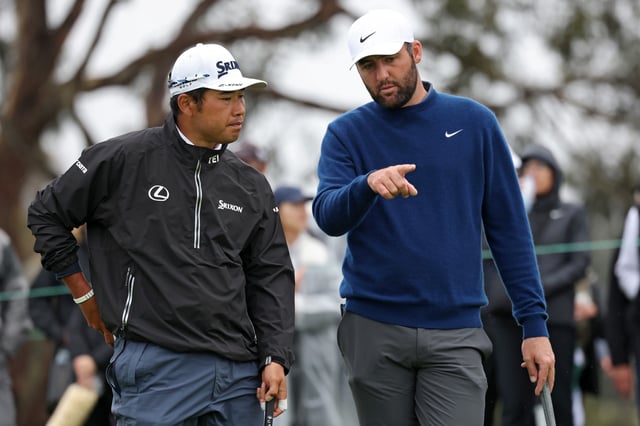 LA JOLLA, CALIFORNIA - FEBRUARY 13: Hideki Matsuyama of Japan (L) and Scottie Scheffler of the United States meet on the second green during the first round of The Genesis Invitational 2025 at Torrey Pines Golf Course on February 13, 2025 in La Jolla, California.