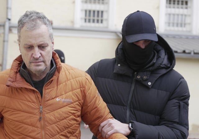 U.S. citizen Marc Fogel being escorted to an airport in Moscow, Russia on February 14, 2025 after being freed in a prisoner swap between Washington and Moscow.