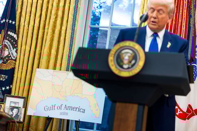 A "Gulf of America" sign behind US President Donald Trump during a swearing-in ceremony for Tulsi Gabbard, US director of National Intelligence, not pictured, in the Oval Office of the White House in Washington, DC on Wednesday, February 12, 2025.