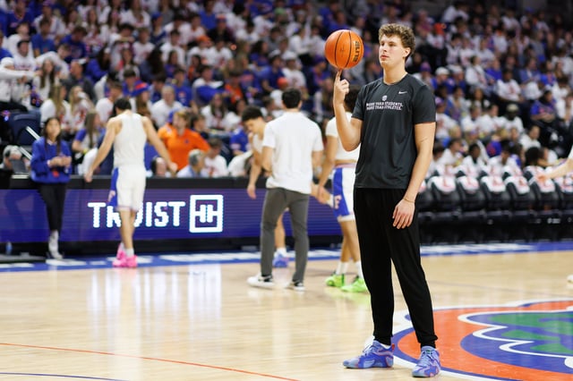 Jan 25, 2025; Gainesville, Florida, USA; Florida Gators center Micah Handlogten (3) spins a ball on his finger before a game against the Georgia Bulldogs at Exactech Arena at the Stephen C. O'Connell Center. Mandatory Credit: Matt Pendleton-Imagn Images/File Photo