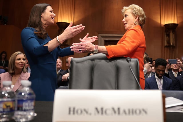 WASHINGTON, DC - FEBRUARY 13: Linda McMahon (R), President Donald Trump’s nominee to be Secretary of Education, hugs U.S. Sen. Katie Britt (R-AL) as she arrives for her Senate Health, Education, Labor and Pensions Committee confirmation hearing in the Dirksen Senate Office Building on February 13, 2025 in Washington, DC.
