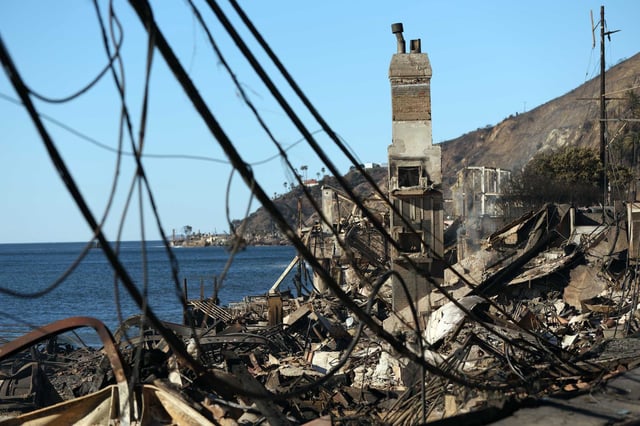 A chimney stands in a home burned in the Palisades Fire along Pacific Coast Highway in Malibu, as seen on Jan. 12.