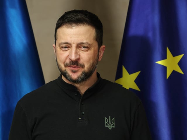 MUNICH, GERMANY - FEBRUARY 15: Ukrainian President Volodymyr Zelensky stands next to a flag of the European Union as he arrives to meet with German Chancellor Olaf Scholz at the 61st Munich Security Conference on February 15, 2025 in Munich, Germany. International defence and security leaders from around the world are gathering for the February 14-16 conference. (Photo by Sean Gallup/Getty Images)