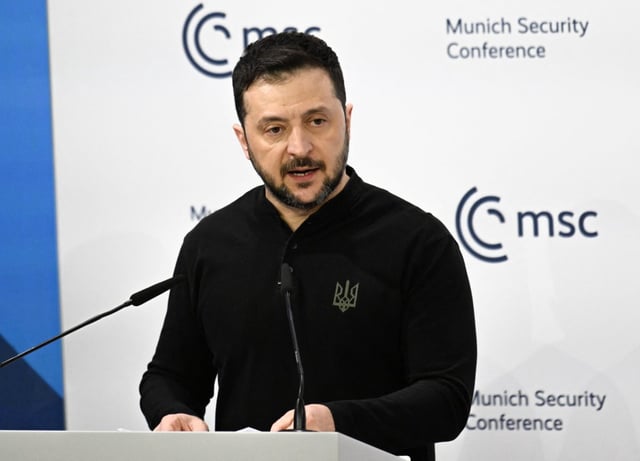 Ukrainian President Volodymyr Zelensky delivers a speech during the 61st Munich Security Conference (MSC) (Photo by THOMAS KIENZLE / AFP).