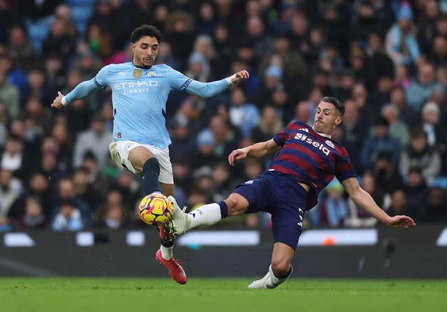 Soccer Football - Premier League - Manchester City v Newcastle United - Etihad Stadium, Manchester, Britain - February 15, 2025 Manchester City's Omar Marmoush in action with Newcastle United's Fabian Schar Action Images via Reuters/Lee Smith
