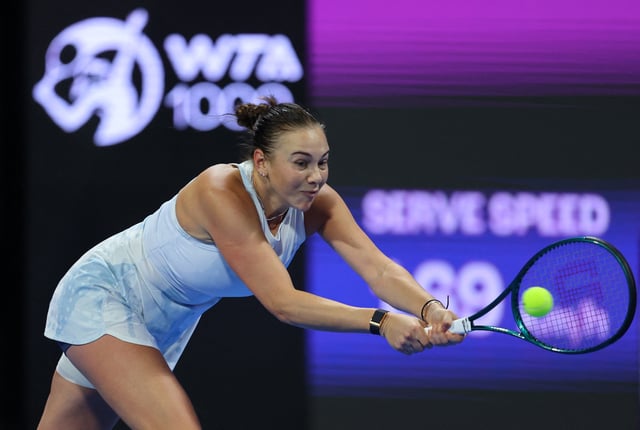 Tennis - Qatar Open - Final - Khalifa International Tennis and Squash Complex, Doha, Qatar - February 15, 2025 Amanda Anisimova of the U.S. in action during the final against Latvia's Jelena Ostapenko REUTERS/Ibraheem Al Omari