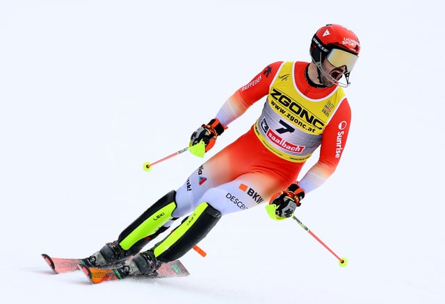 Alpine Skiing - FIS Alpine World Ski Championships - Saalbach, Austria - February 16, 2025 Switzerland's Loic Meillard reacts after his run during the Men's Slalom REUTERS/Lisi Niesner