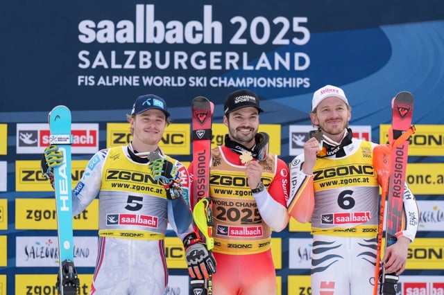 (From L) Second-placed Atle Lie McGrath, winner Loic Meillard and third-placed Linus Strasser