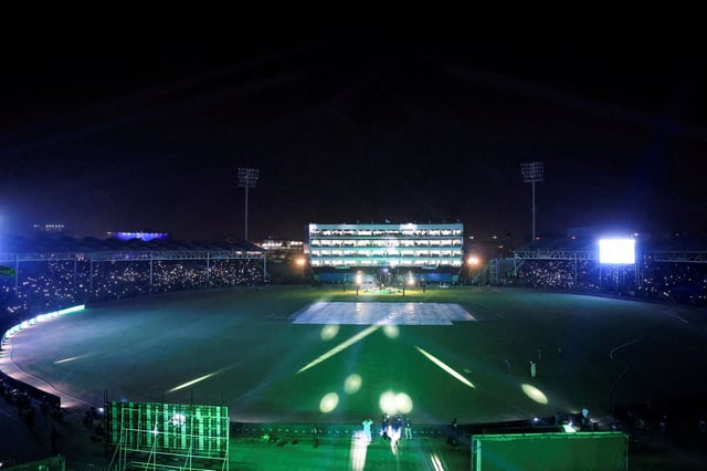 People flash lights from their mobile phones during the inauguration of the National Bank Stadium after the completion of renovation works ahead of the ICC Champions Trophy 2025 tournament in Karachi, Pakistan February 11, 2025. REUTERS/Akhtar Soomro/File Photo