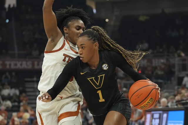 Feb 6, 2025; Austin, Texas, USA; Vanderbilt Commodores guard Mikayla Blakes (1) drives to the basket against Texas Longhorns guard Rori Harmon (3) during the first half at Moody Center. Mandatory Credit: Scott Wachter-Imagn Images/File Photo