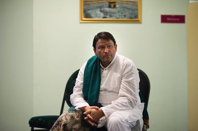 Imam Muhsin Hendricks is pictured preparing for the start of the Jumu'ah prayer at the Inner Circle Mosque, in Wynberg, on September 2, 2016, in Cape Town.