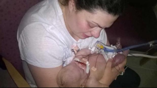 Theresa Smith with her daughter Sophia, who died at 11 days old
