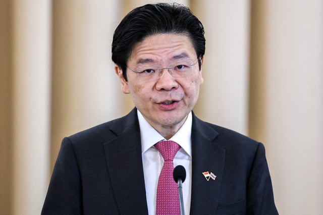 Singapore's Prime Minister Lawrence Wong speaks during a signing ceremony and press conference at the Government House, in Bangkok, Thailand, November 28, 2024. REUTERS/Athit Perawongmetha/ File Photo