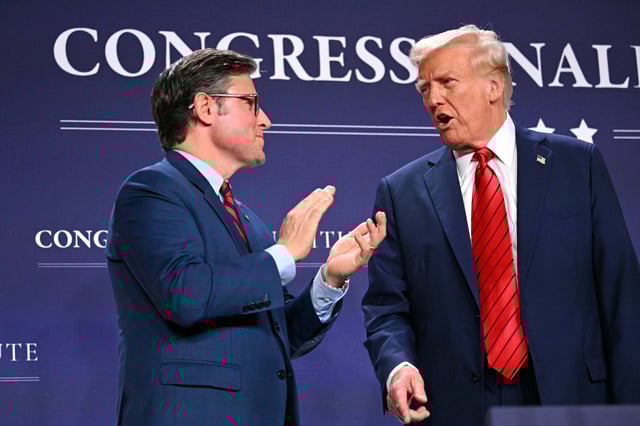 President Donald Trump and Speaker of the House Mike Johnson, from left, at the House Republican Members Conference Dinner at Trump National Doral Miami, in Miami, on Jan. 27, 2025.