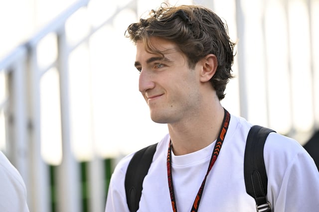 Oct 20, 2024; Austin, Texas, USA; Alpine reserve driver Jack Doohan walks through the track entrance before the 2024 Formula One US Grand Prix at Circuit of the Americas. Mandatory Credit: Jerome Miron-Imagn Images/File Photo