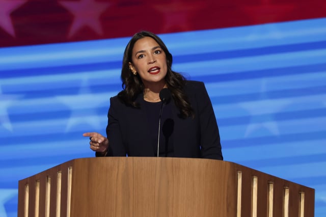 CHICAGO, ILLINOIS - AUGUST 19: Rep. Alexandria Ocasio-Cortez (D-NY) speaks onstage during the first day of the Democratic National Convention at the United Center on August 19, 2024 in Chicago, Illinois.  Delegates, politicians, and Democratic party supporters are in Chicago for the convention, concluding with current Vice President Kamala Harris accepting her party&#39;s presidential nomination. The DNC takes place from August 19-22. (Photo by Alex Wong/Getty Images)