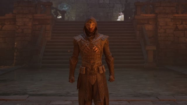 A man in a dark cloak and mask called Ygwulf in Avowed.