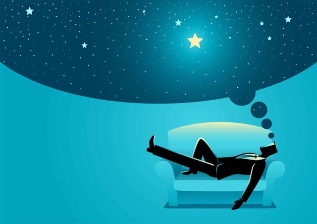 man dreamingbwhile sleeping on sofa