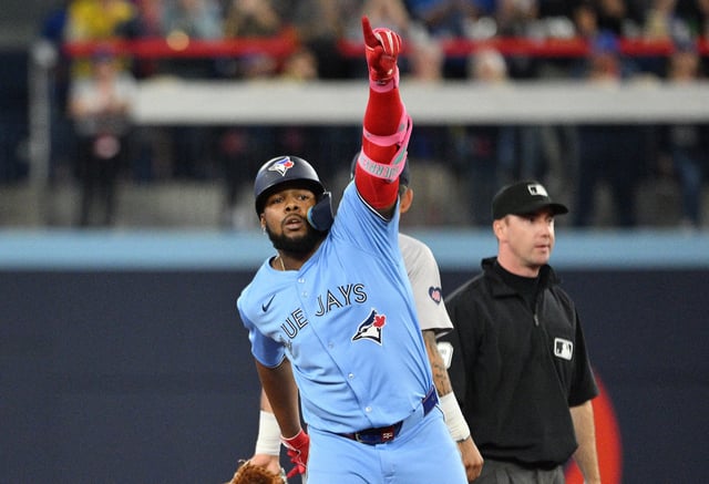 Sep 24, 2024; Toronto, Ontario, CAN; Toronto Blue Jays designated hitter Vladimir Guerrero Jr. (27) reacts after hitting a two run RBI double against the Boston Red Sox in the third inning at Rogers Centre. Mandatory Credit: Dan Hamilton-Imagn Images/File Photo