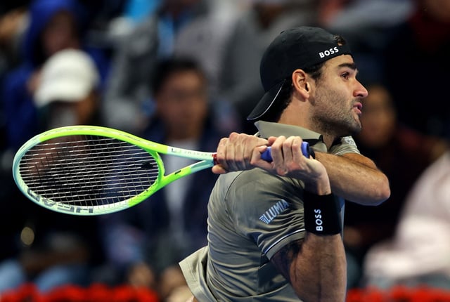 Tennis - Qatar Open - Khalifa International Tennis and Squash Complex, Doha, Qatar - February 18, 2025 Italy's Matteo Berrettini in action during his round of 32 match against Serbia's Novak Djokovic REUTERS/Ibraheem Al Omari