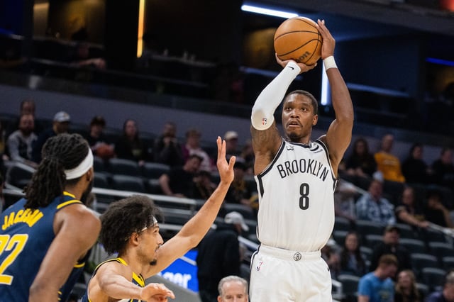 Apr 1, 2024; Indianapolis, Indiana, USA; Brooklyn Nets guard Lonnie Walker IV (8) shoots the ball while Indiana Pacers guard Kendall Brown (10) defends in the second half at Gainbridge Fieldhouse. Mandatory Credit: Trevor Ruszkowski-USA TODAY Sports/File Photo