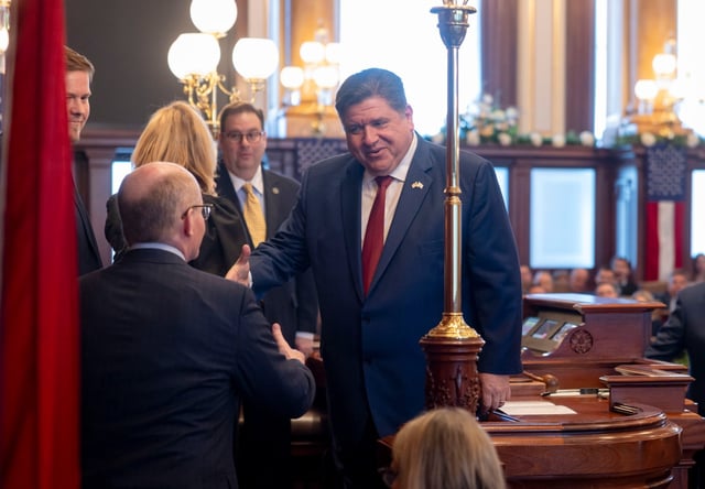 Gov. JB Pritzker congratulates Senate President Don Harmon on his reelection on Jan. 8, 2025, at the Illinois State Capitol in Springfield. (Brian Cassella/Chicago Tribune)