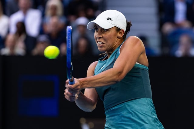 Jan 25, 2025; Melbourne, Victoria, Australia; Madison Keys of United States of America plays a backhand during her match against Aryna Sabalenka in the final of the women's singles at the 2025 Australian Open at Melbourne Park. Mandatory Credit: Mike Frey-Imagn Images/File Photo
