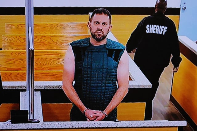 Nathan Gingles appears via video at the Broward County Courthouse on Tuesday, Feb. 18, 2025. Gingles faces three counts of first-degree murder. (Joe Cavaretta/South Florida Sun Sentinel)