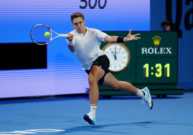 Tennis - Qatar Open - Khalifa International Tennis and Squash Complex, Doha, Qatar - February 18, 2025 Serbia's Hamad Medjedovic in action during his round of 32 match against Greece's Stefanos Tsitsipas REUTERS/Ibraheem Al Omari