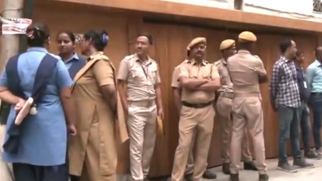 Heavy deployment of police personnel was seen outside the family's home under Tangra police station. 