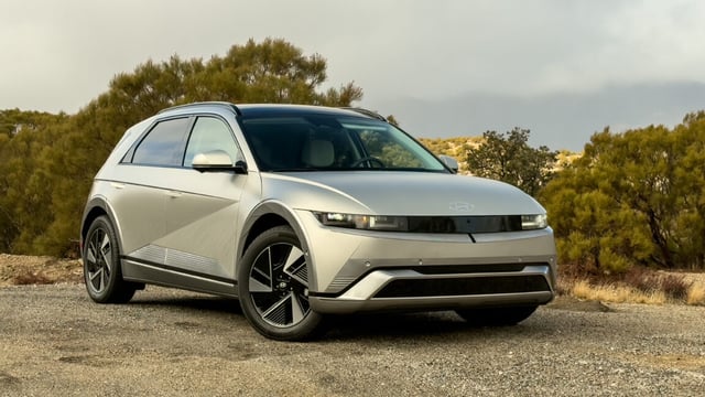 A silver Hyundai Ioniq 5 N parked by the side of a road