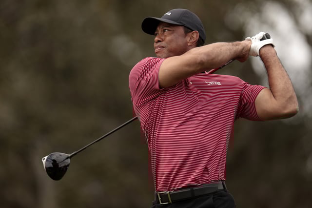 Tiger Woods of the United States plays his shot from the 16th tee during the second round of the PNC Championship at Ritz-Carlton Golf Club on December 22, 2024 in Orlando, Florida.