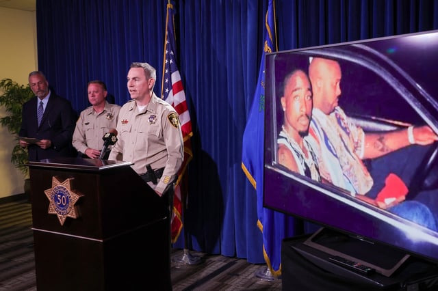 Tupac Shakur and Marion "Suge" Knight Jr. in a car in Las Vegas the night Shakur was killed, as Clark County District Attorney Steve Wolfson, Clark County Sheriff Kevin McMahill and Las Vegas Metropolitan Police Department Lt. Jason Johansson hold a news conference at the LVMPD headquarters on the arrest and indictment of Duane "Keefe D" Davis for the 1996 murder of Shakur on Sept. 29, 2023, in Las Vegas.