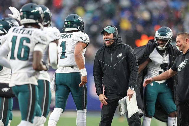Dec 11, 2022; East Rutherford, New Jersey, USA; Philadelphia Eagles assistant coach Kevin Patullo celebrates with quarterback Jalen Hurts (1) after a touchdown during the second half against the New York Giants at MetLife Stadium. Mandatory Credit: Vincent Carchietta-USA TODAY Sports/File Photo