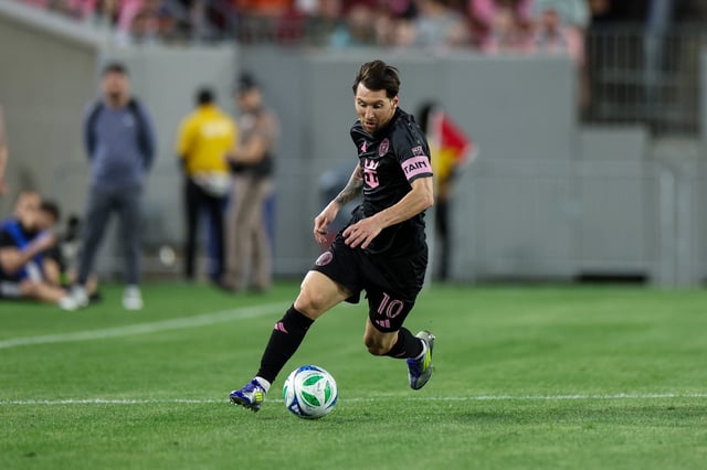 Inter Miami CF forward Lionel Messi controls the ball against Orlando City in the first half at Raymond James Stadium.