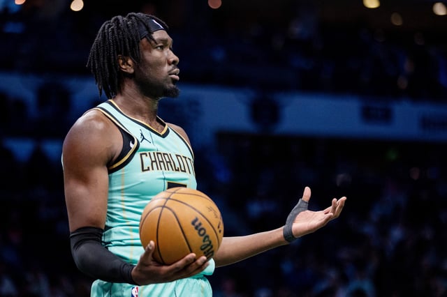 Jan 24, 2025; Charlotte, North Carolina, USA; Charlotte Hornets center Mark Williams (5) reacts after a foul against the Portland Trail Blazers during the third quarter at Spectrum Center. Mandatory Credit: Scott Kinser-Imagn Images/File Photo