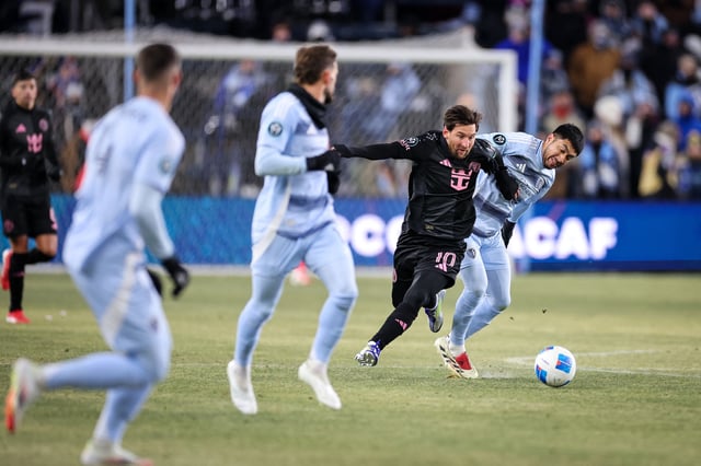 Feb 19, 2025; Kansas City, Kansas, USA; Inter Miami forward Lionel Messi (10) drives up field during the first half against the Sporting Kansas City at Children's Mercy Park. Mandatory Credit: William Purnell-Imagn Images