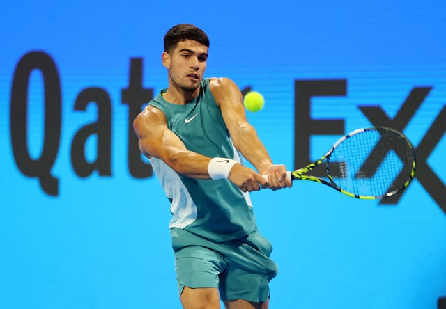 Tennis - Qatar Open - Khalifa International Tennis and Squash Complex, Doha, Qatar - February 19, 2025 Spain's Carlos Alcaraz in action during his round of 16 match against Italy's Luca Nardi REUTERS/Ibraheem Al Omari